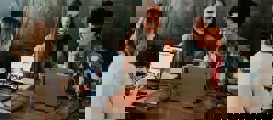 employees having a meeting about iso 45003